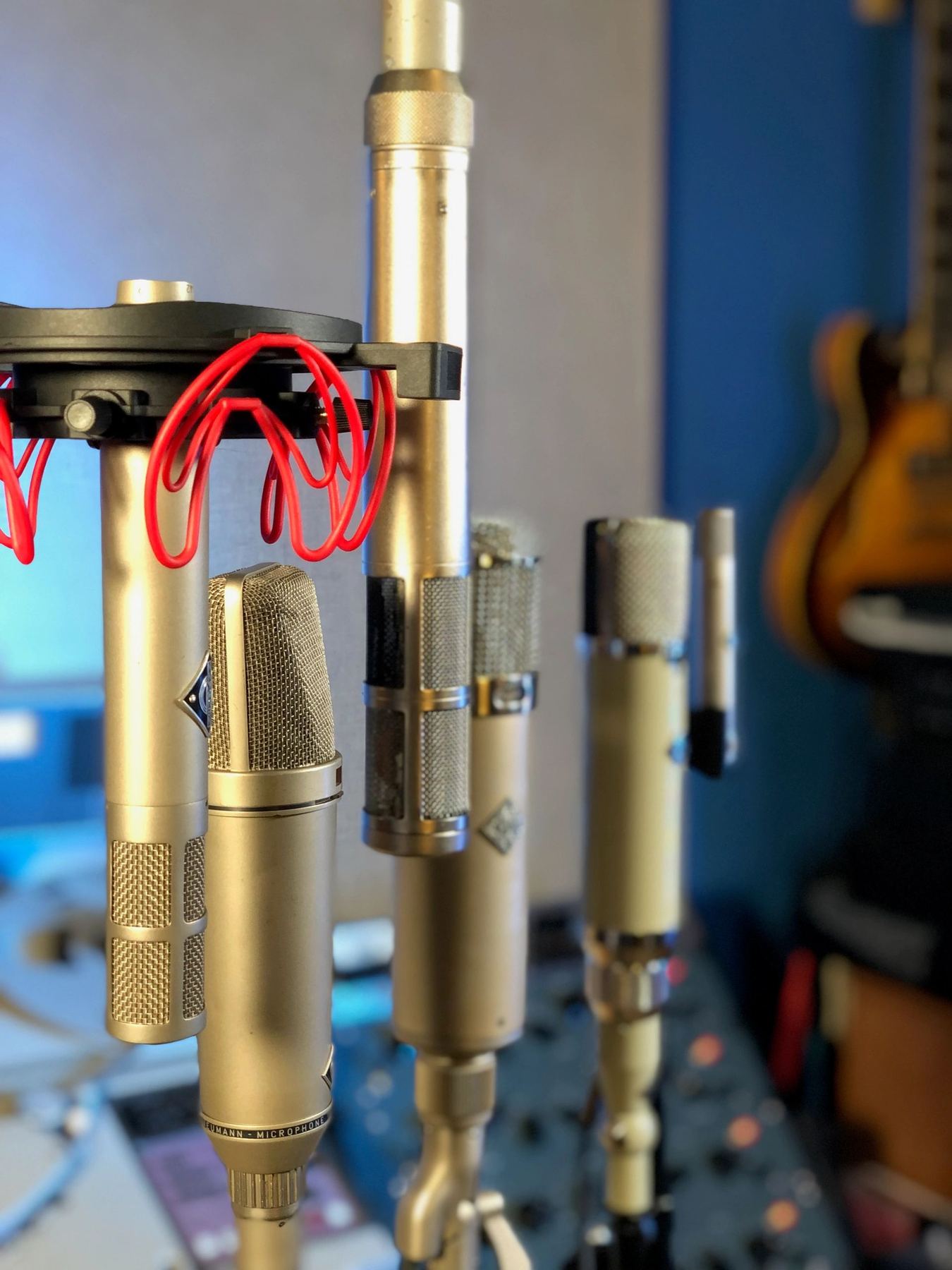 Vintage microphones on stands in the studio